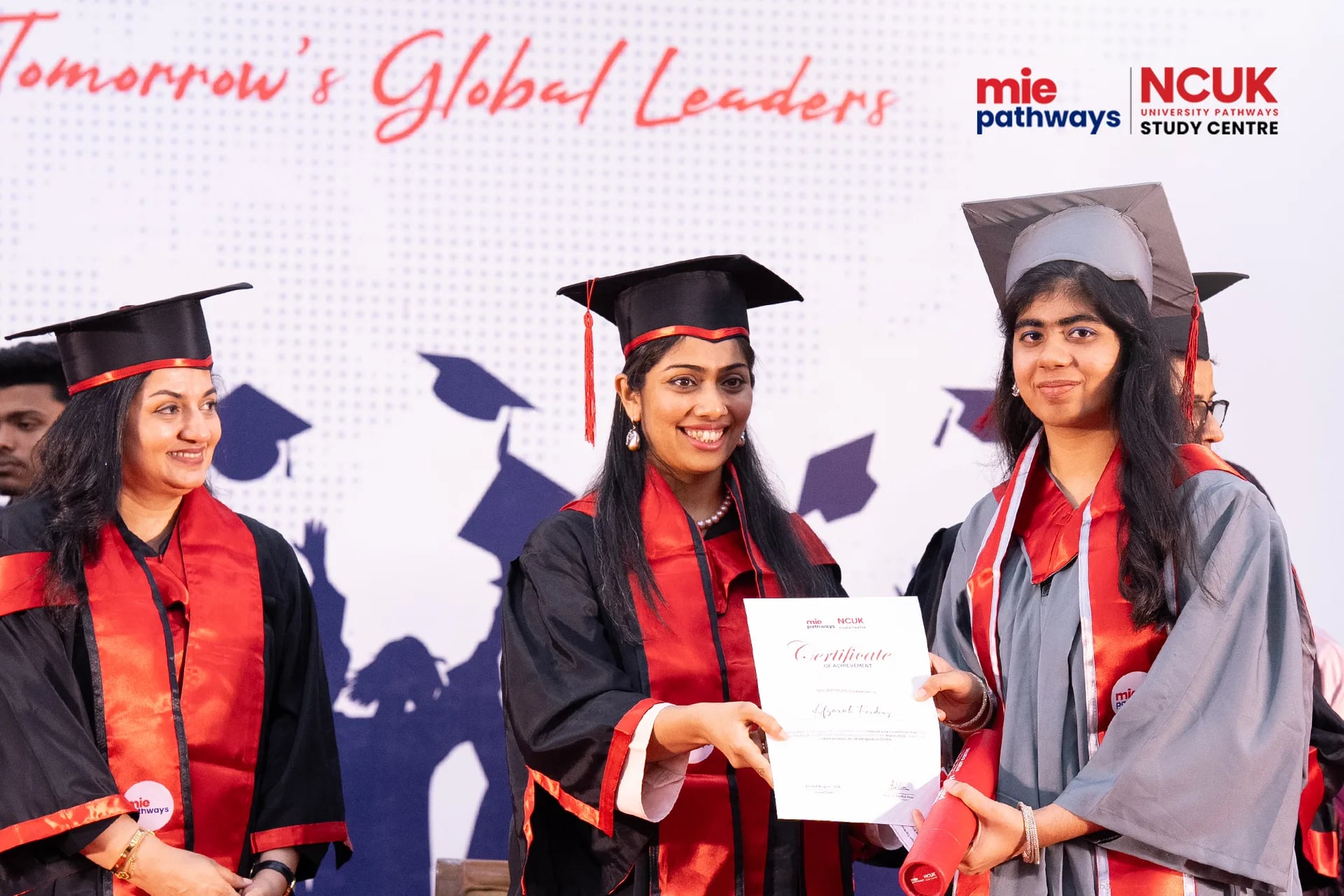 Graduates receiving their certificates at the NCUK Graduation Ceremony 2026 — photo 5