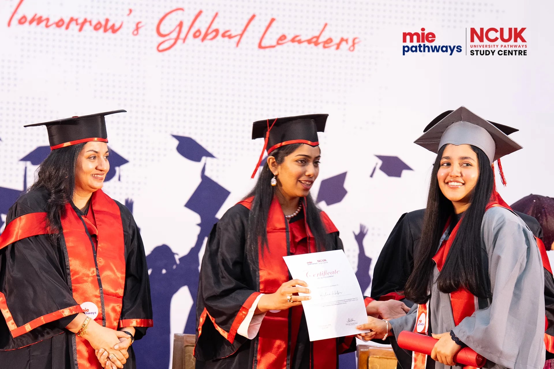 Graduates receiving their certificates at the NCUK Graduation Ceremony 2026 — photo 7