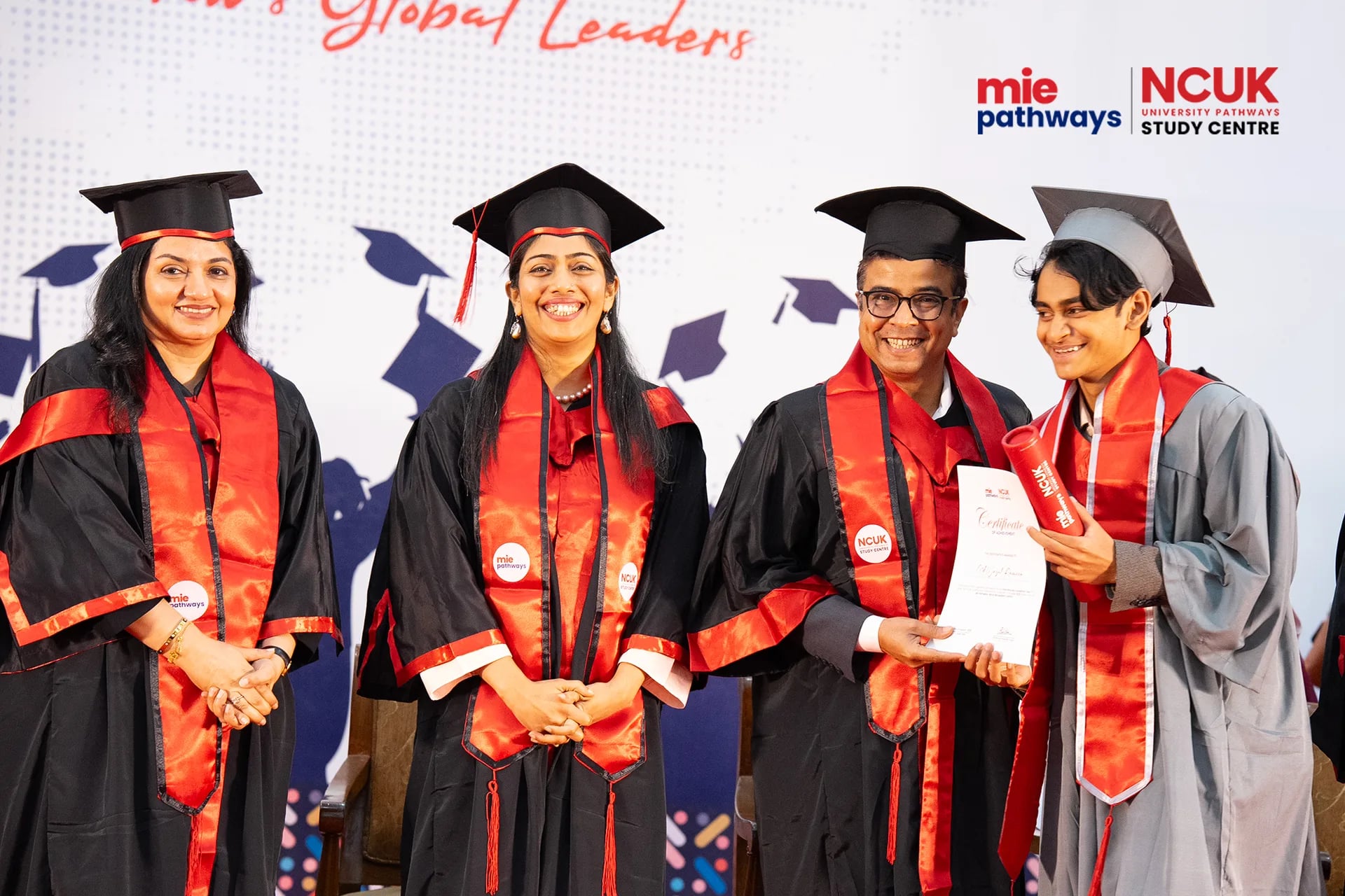Graduates receiving their certificates at the NCUK Graduation Ceremony 2026 — photo 8