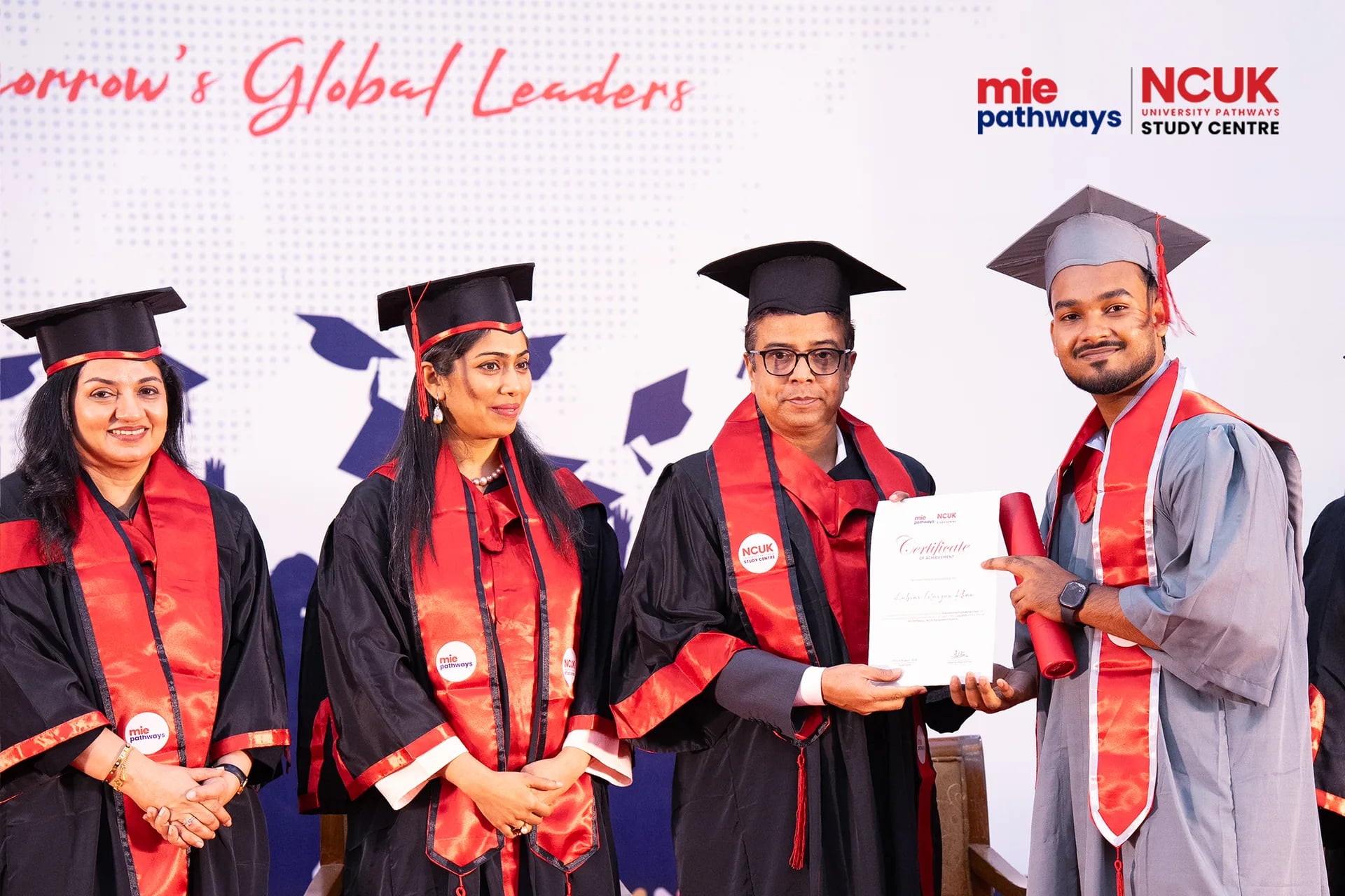 Graduates receiving their certificates at the NCUK Graduation Ceremony 2026 — photo 15