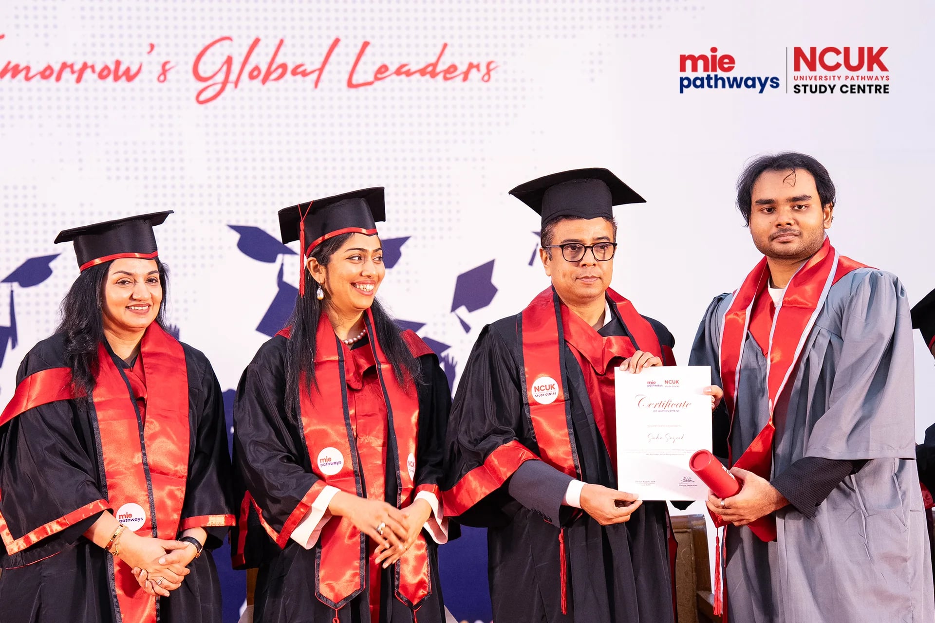 Graduates receiving their certificates at the NCUK Graduation Ceremony 2026 — photo 16