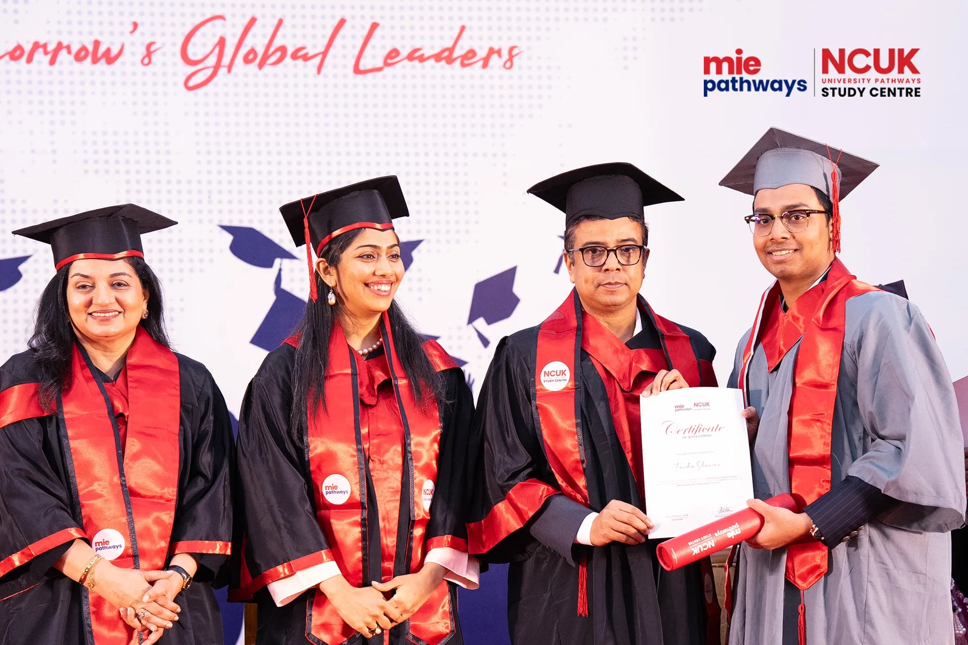 Graduates receiving their certificates at the NCUK Graduation Ceremony 2026 — photo 18
