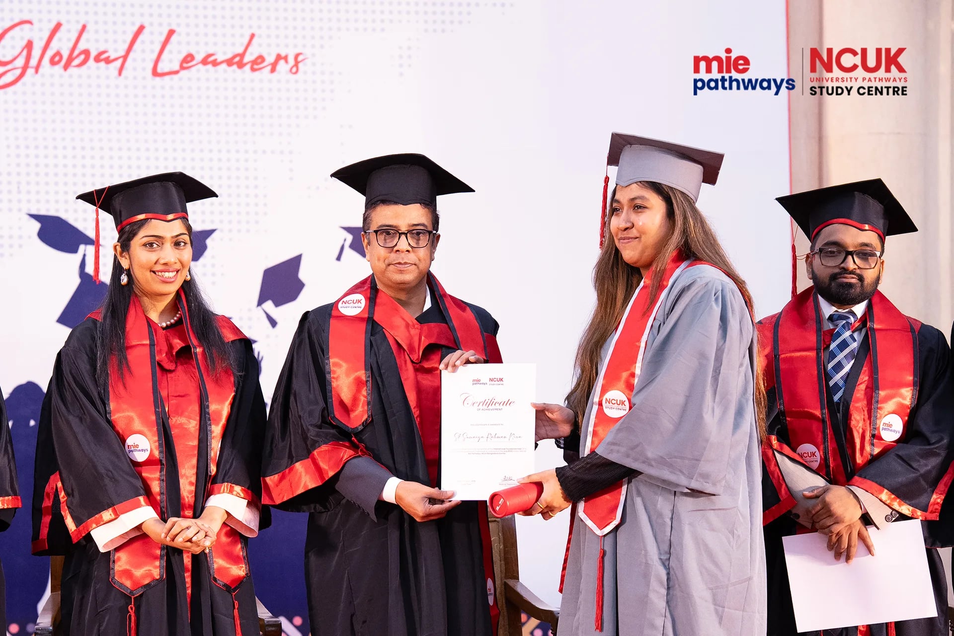 Graduates receiving their certificates at the NCUK Graduation Ceremony 2026 — photo 21