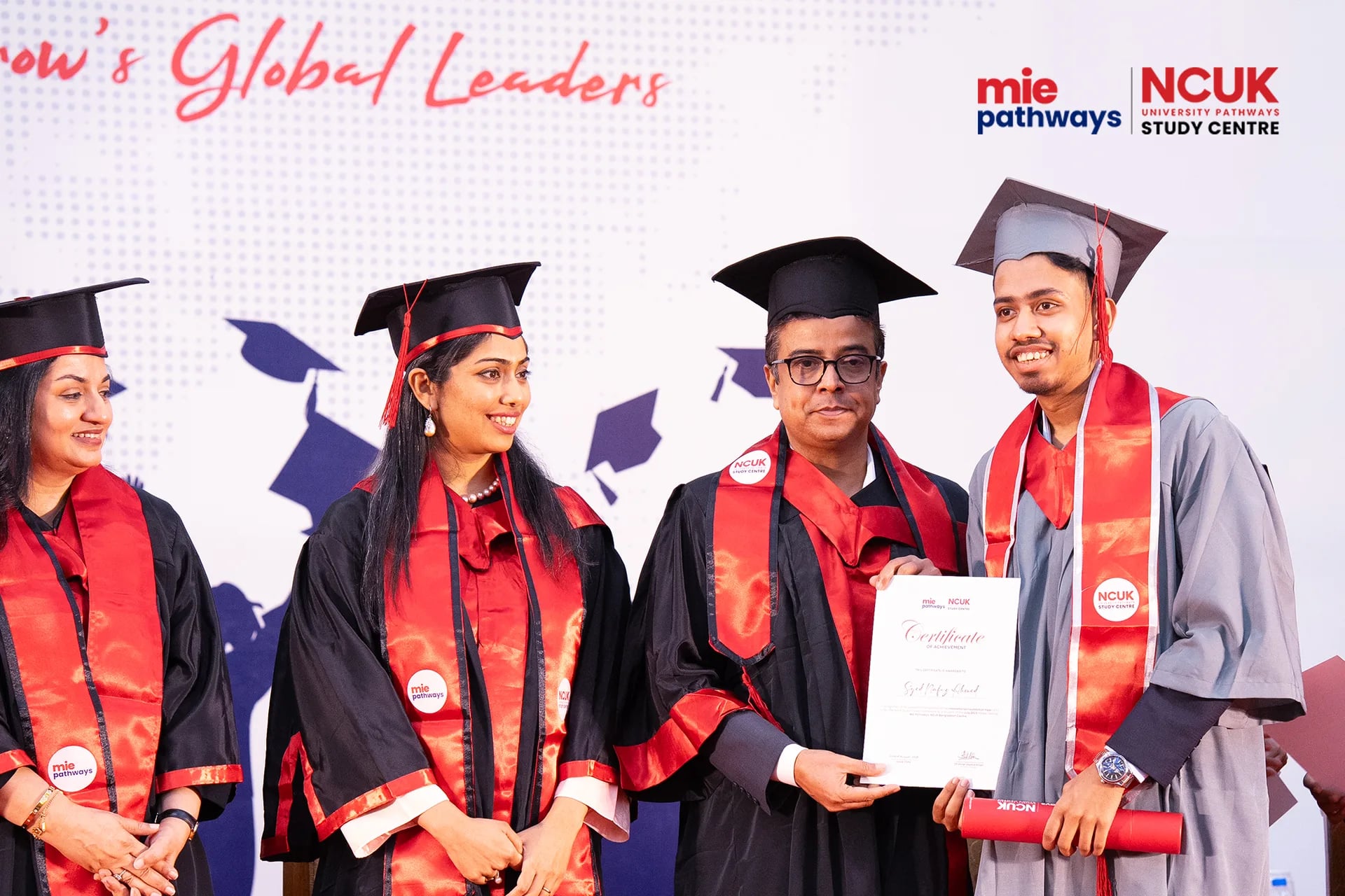 Graduates receiving their certificates at the NCUK Graduation Ceremony 2026 — photo 22