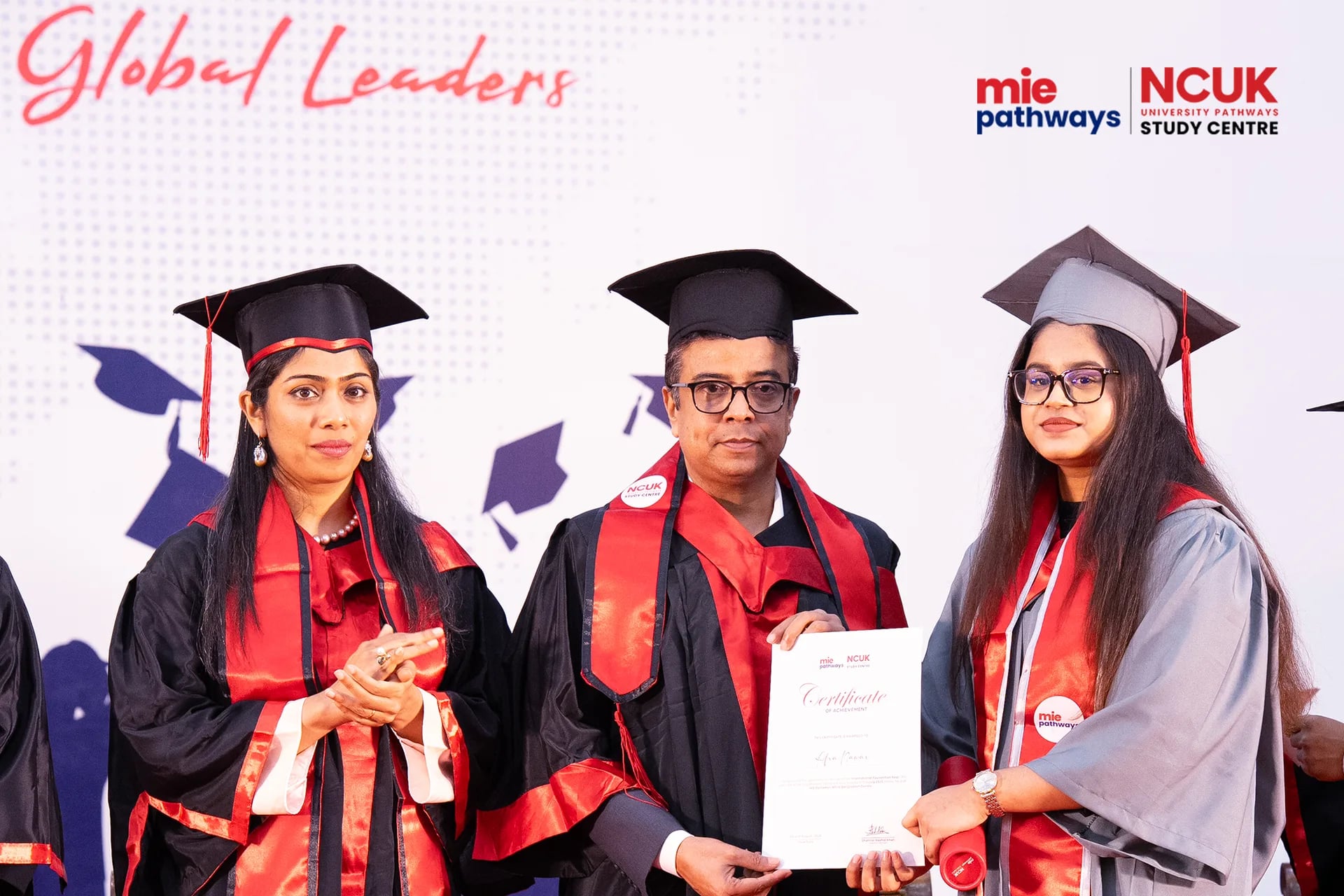 Graduates receiving their certificates at the NCUK Graduation Ceremony 2026 — photo 23