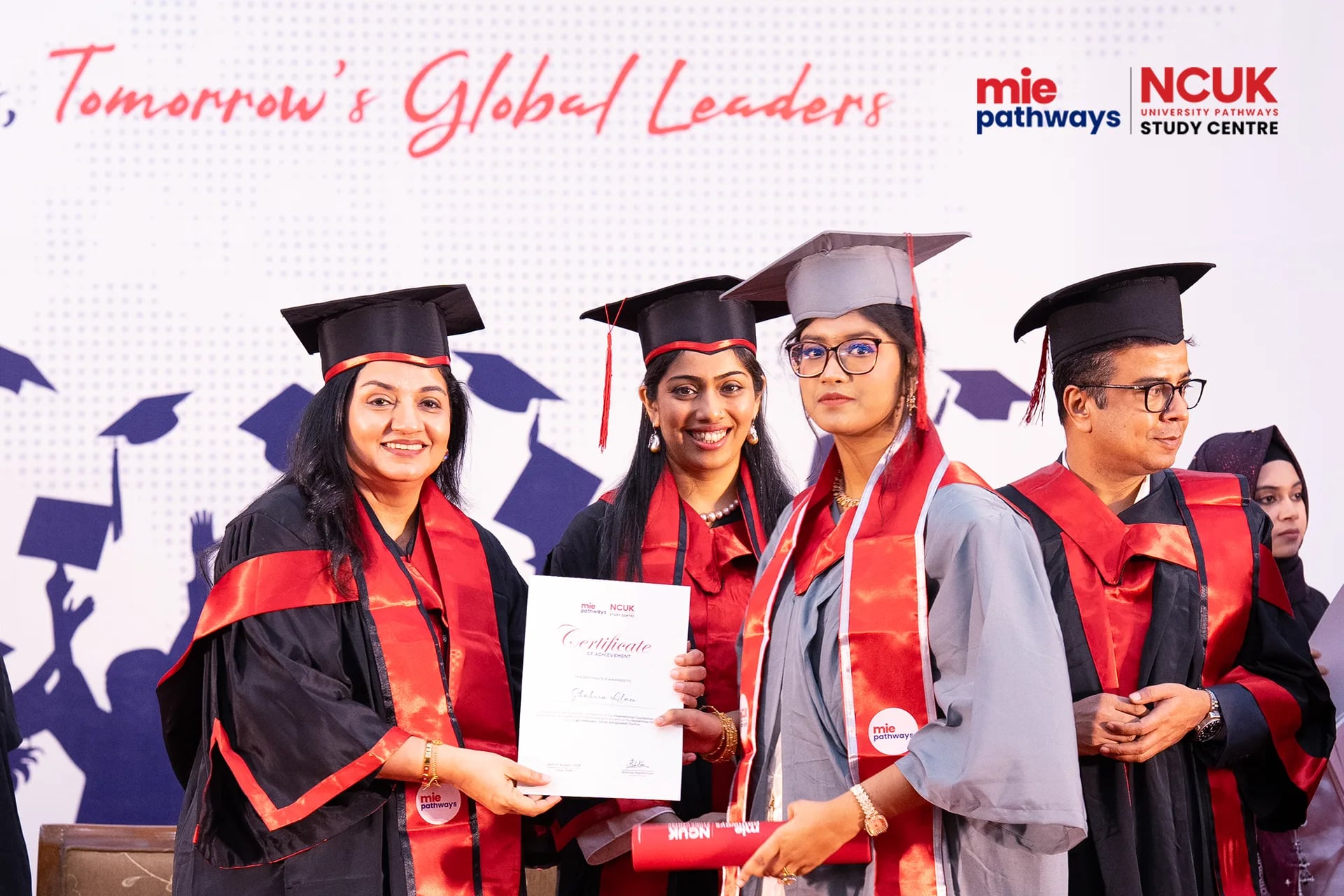Graduates receiving their certificates at the NCUK Graduation Ceremony 2026 — photo 27
