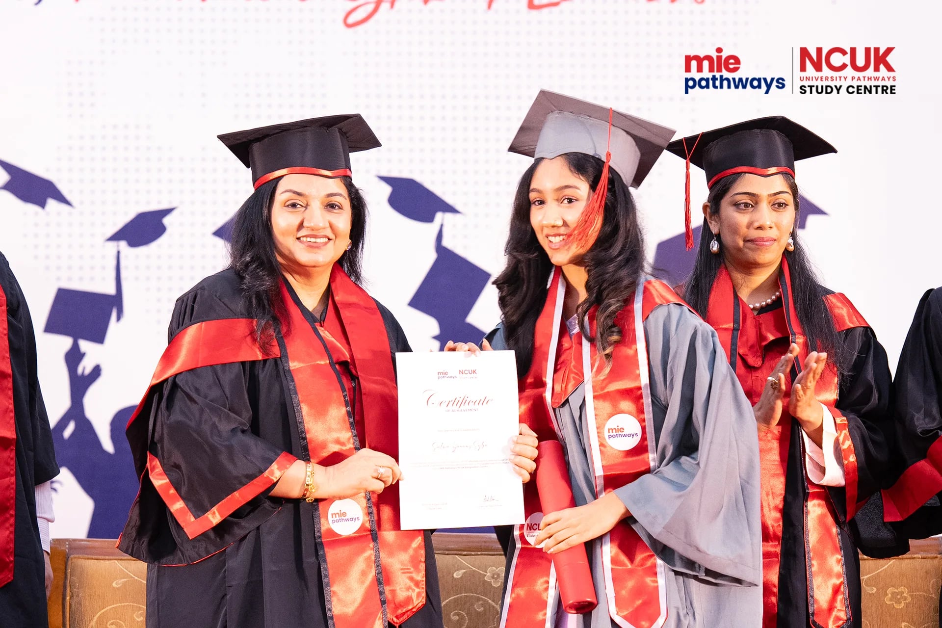 Graduates receiving their certificates at the NCUK Graduation Ceremony 2026 — photo 28