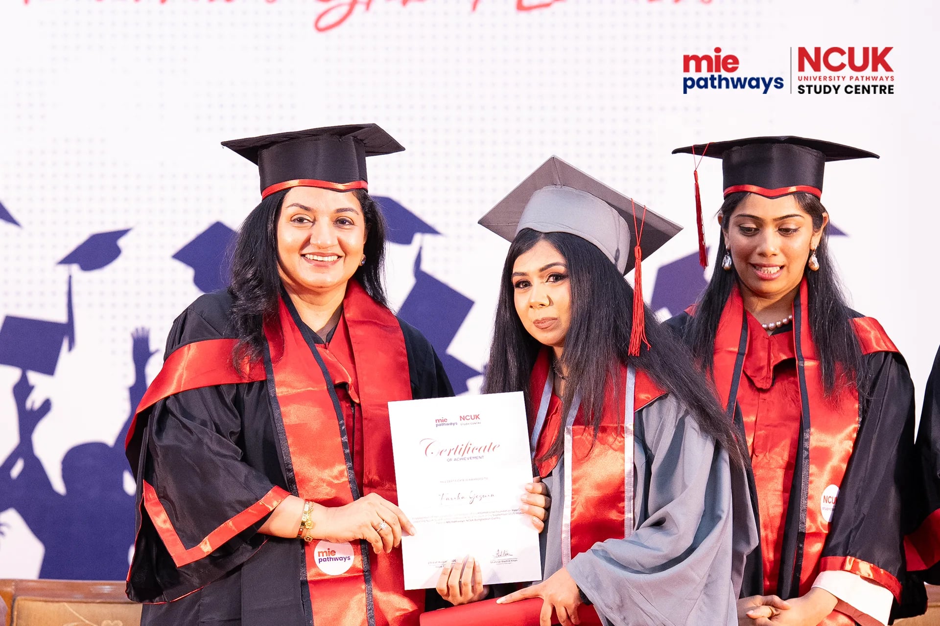 Graduates receiving their certificates at the NCUK Graduation Ceremony 2026 — photo 30