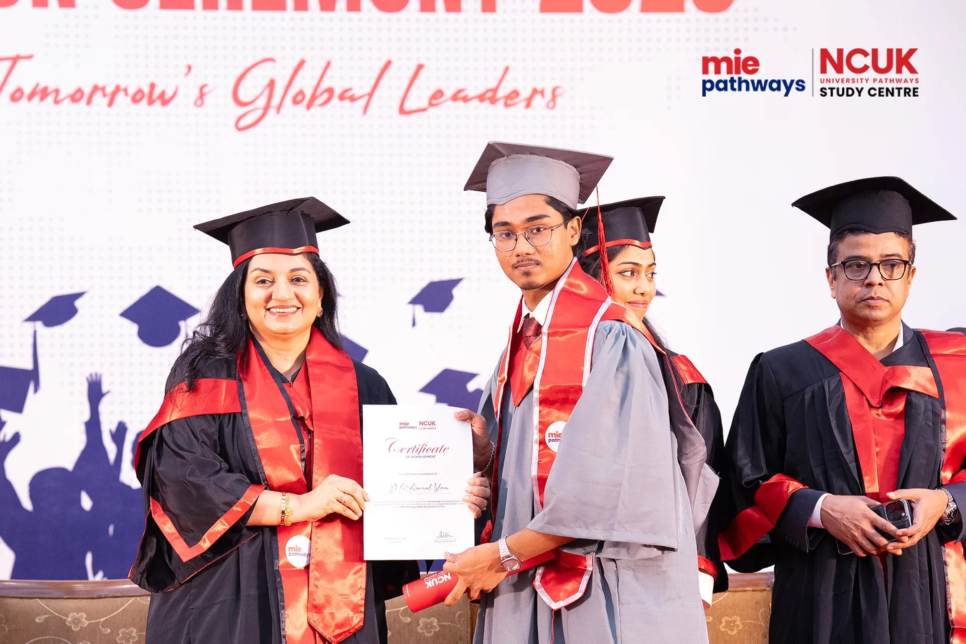 Graduates receiving their certificates at the NCUK Graduation Ceremony 2026 — photo 32