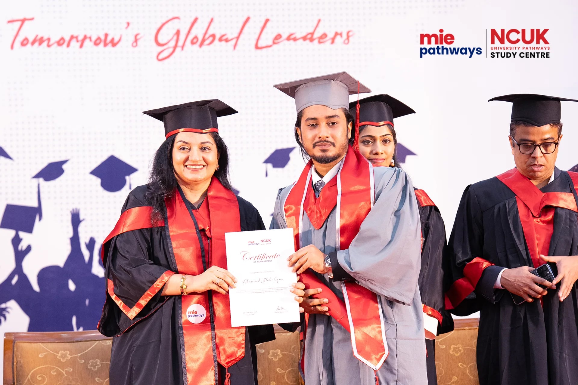 Graduates receiving their certificates at the NCUK Graduation Ceremony 2026 — photo 34