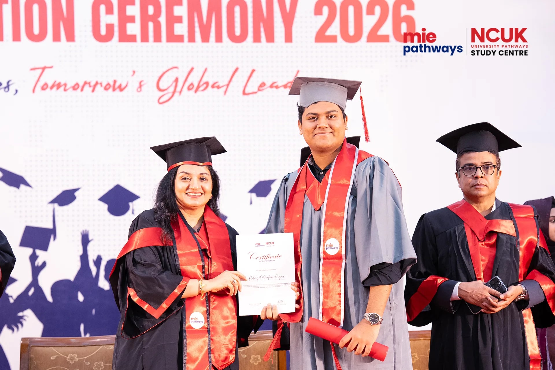 Graduates receiving their certificates at the NCUK Graduation Ceremony 2026 — photo 36
