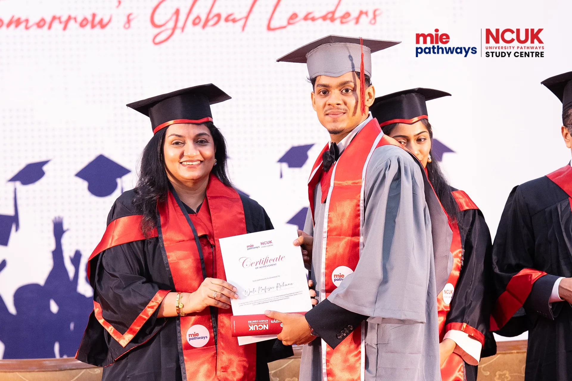 Graduates receiving their certificates at the NCUK Graduation Ceremony 2026 — photo 37