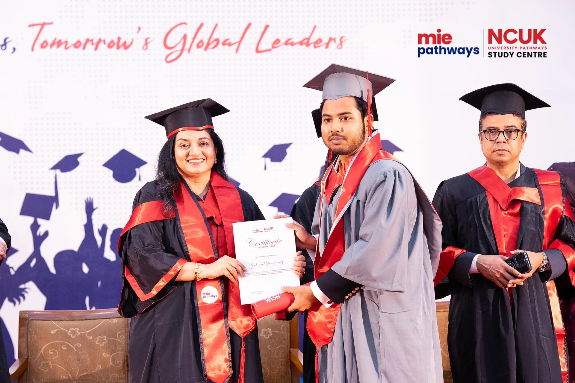 Graduates receiving their certificates at the NCUK Graduation Ceremony 2026 — photo 40