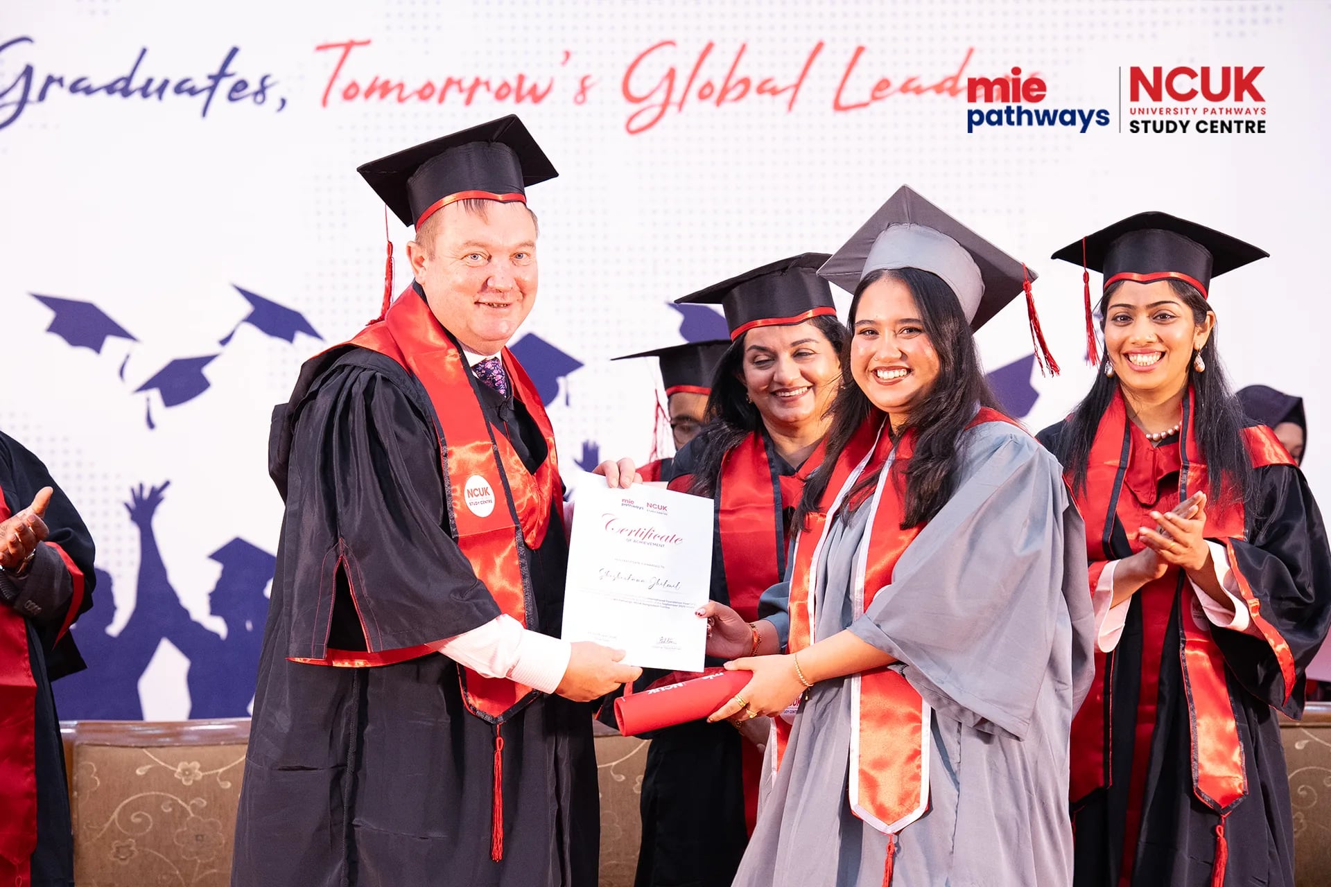 Graduates receiving their certificates at the NCUK Graduation Ceremony 2026 — photo 46