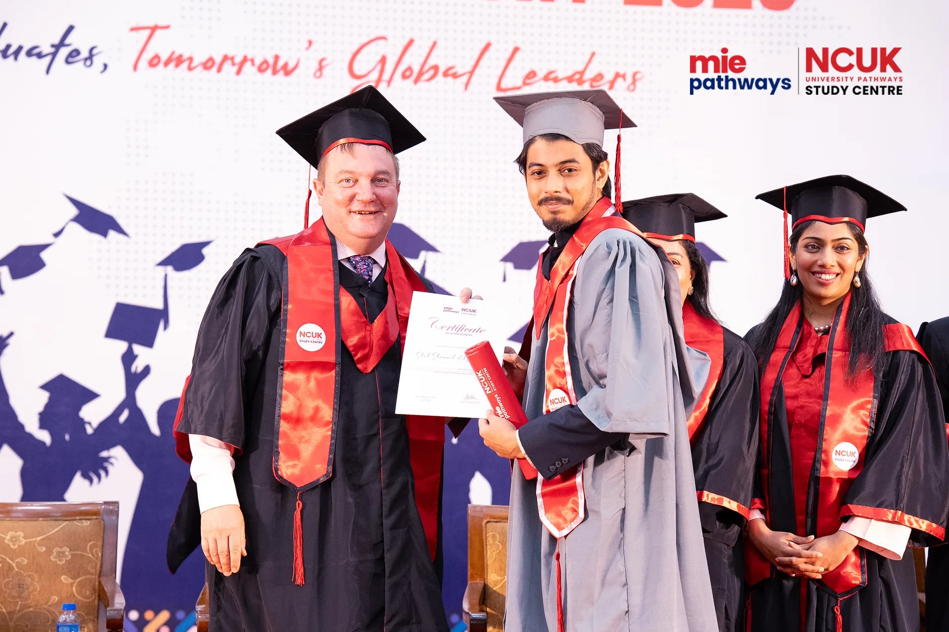 Graduates receiving their certificates at the NCUK Graduation Ceremony 2026 — photo 47