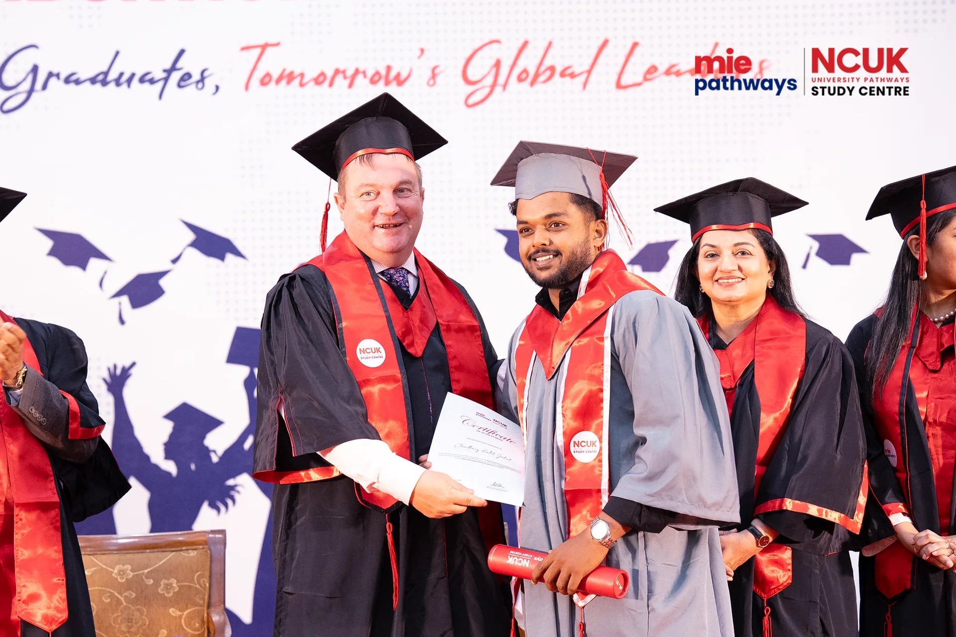 Graduates receiving their certificates at the NCUK Graduation Ceremony 2026 — photo 49