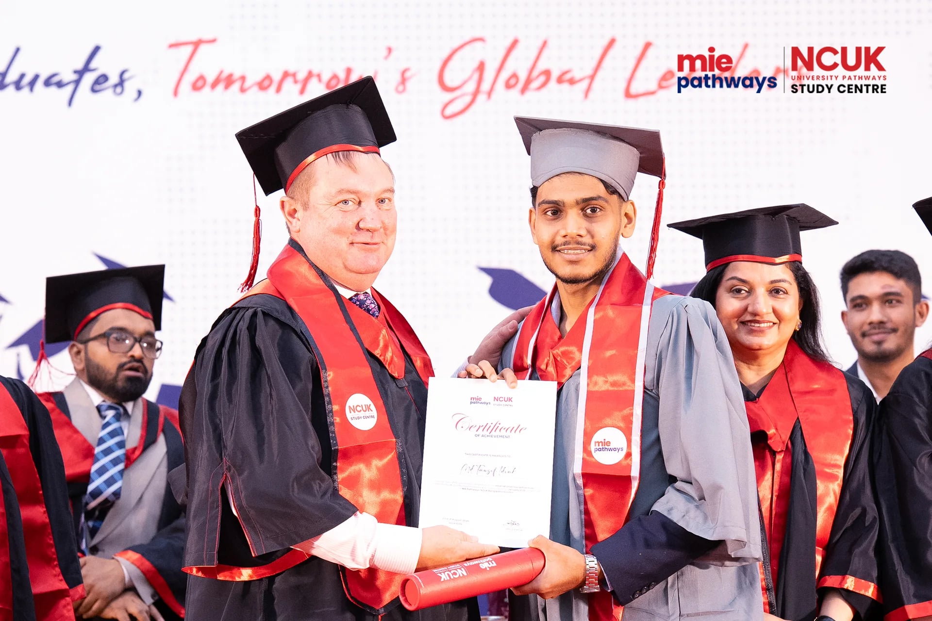 Graduates receiving their certificates at the NCUK Graduation Ceremony 2026 — photo 50